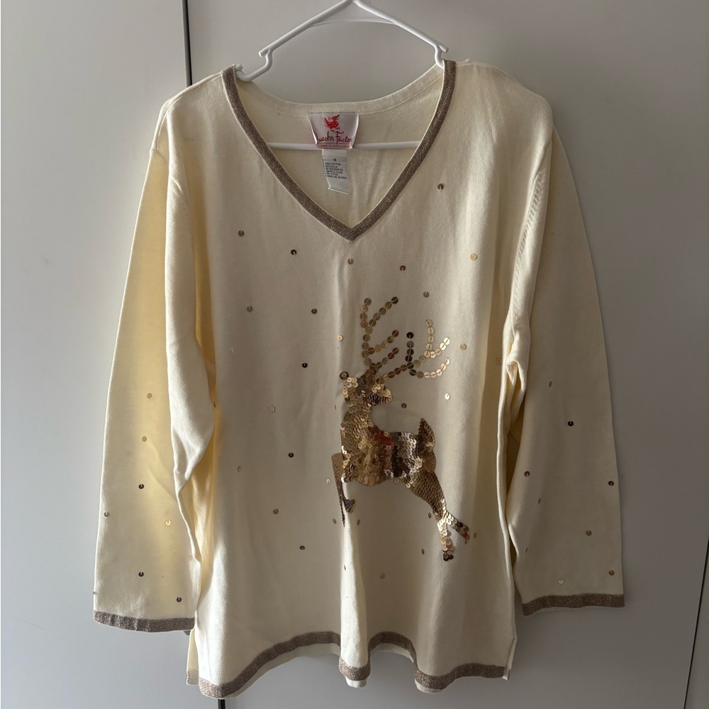 Quacker Factory Cream V-Neck Sweater with gold bedazzled reindeer.